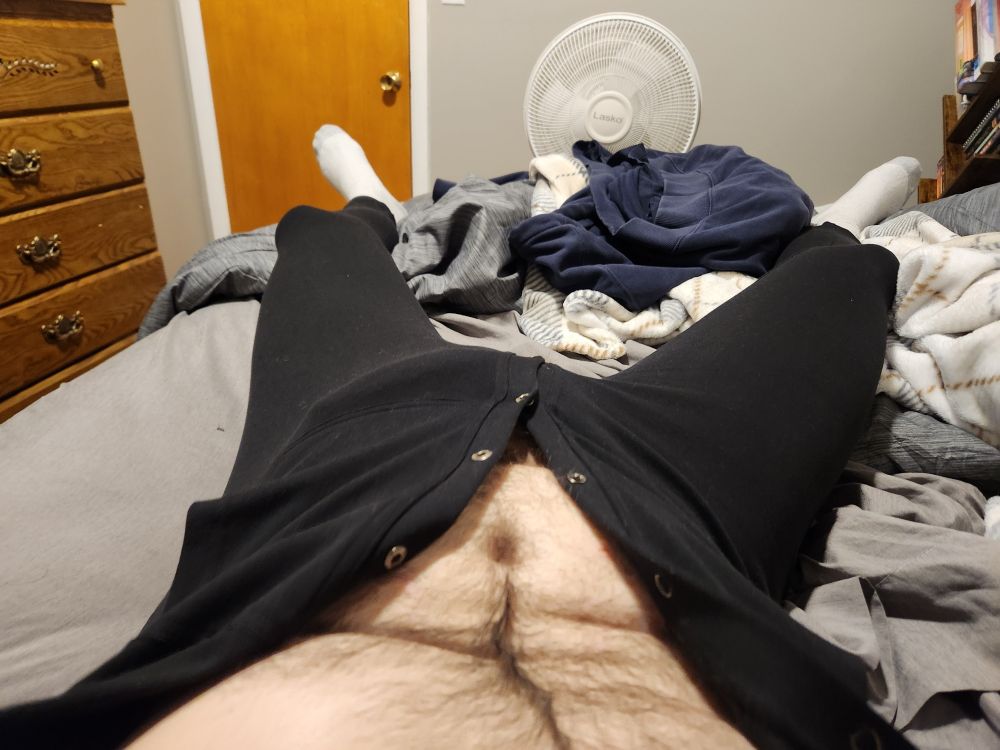 Me laying in bed in a union suit