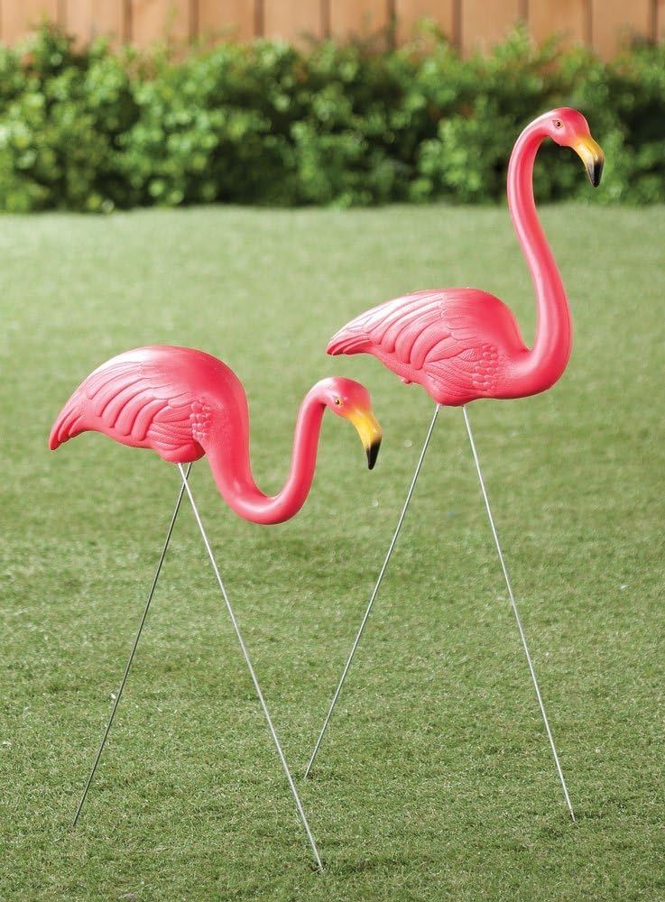 Bright pink plastic lawn flamingos 