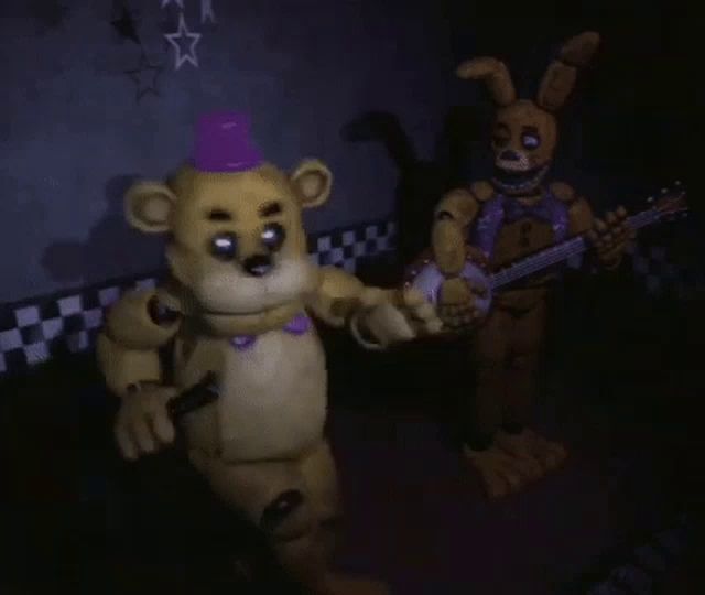 a teddy bear and a bunny are dancing in a dark room . the teddy bear is wearing a purple hat .