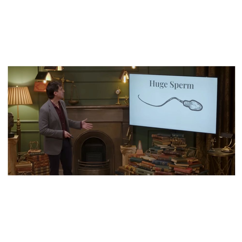smartypants
a man in front of a screen that has a sperm and says "huge sperm"