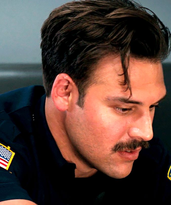 Eddie Diaz with his handsome mustache at 3/4 angle