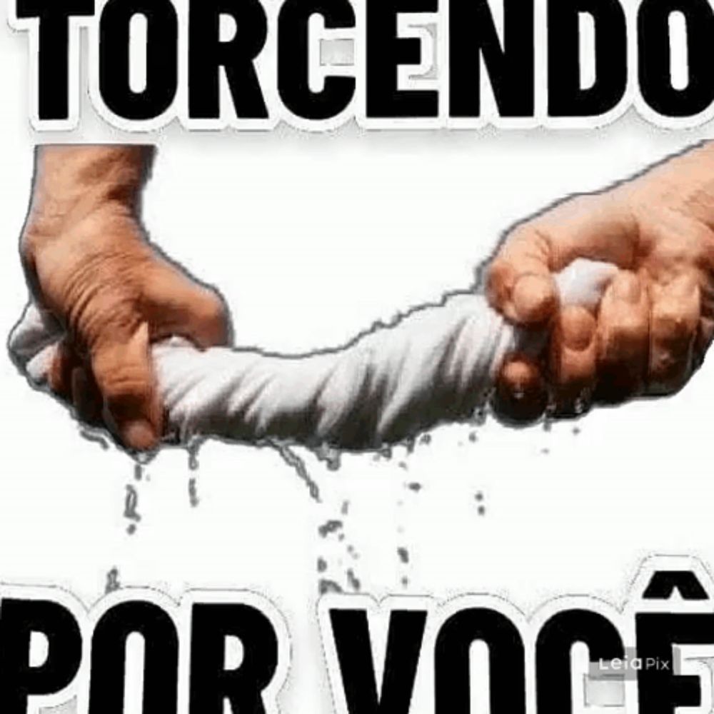 a person is holding a piece of cloth in their hands with the words torcendo por voce written on it .