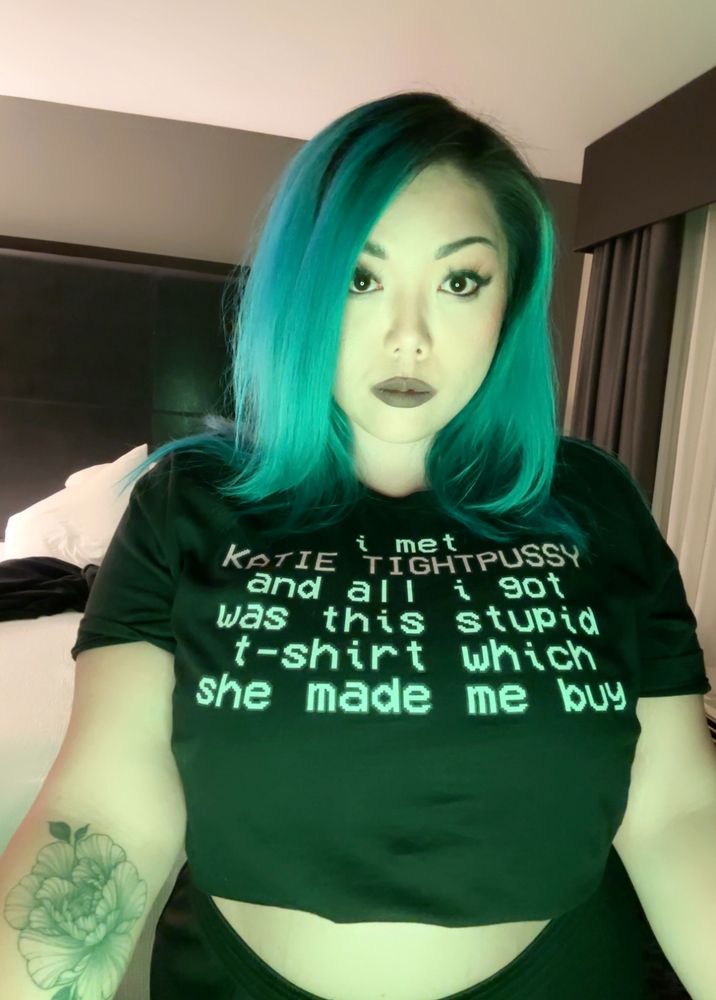 Kimb wearing a shirt it says

I MET 
KATIE TIGHTPUSSY
and all i got was this stupid t-shirt which she made me buy
