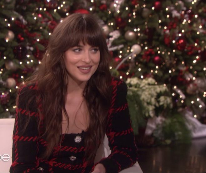 a festive Dakota Johnson on the Ellen Show