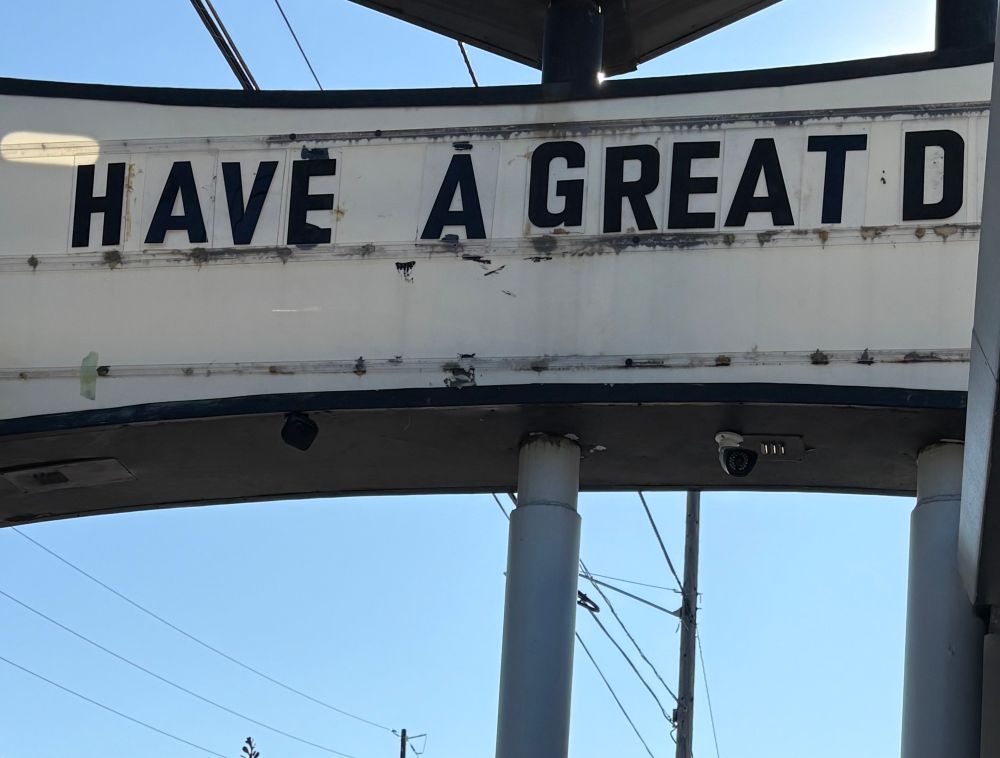 a sign out in front of an auto parts place where some of the letters are missing and it says “Have a Great D”
~photo by me taken 7/3/25