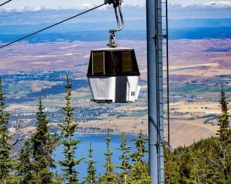 Image showing a gondola rising above Wallowa Lake.