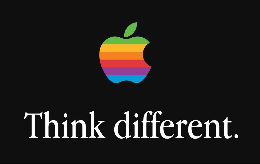 An old Apple Computer logo—an apple in rainbow stripes. Under it is written “Think different”