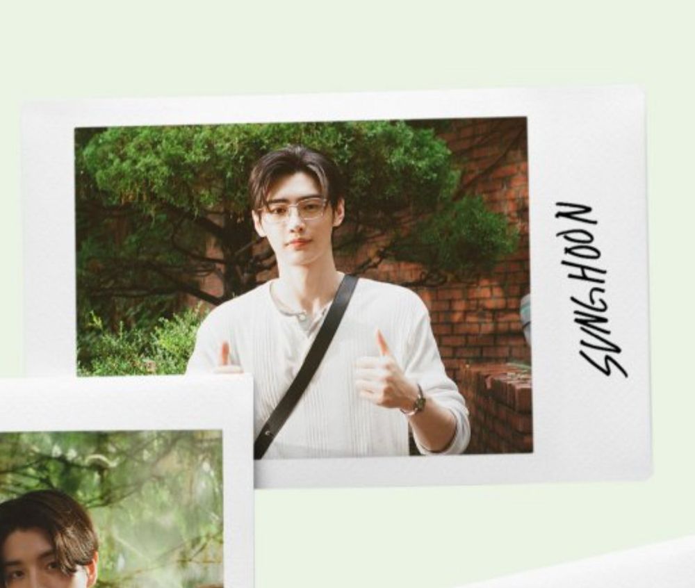 Sunghoon in the enhypen 2026 season’s greetings preview; he’s wearing glasses and a plain longsleeve while giving a thumbs up