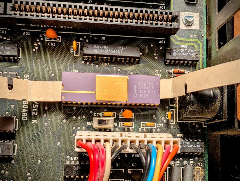 A close-up view of an 80287 math co-processor.