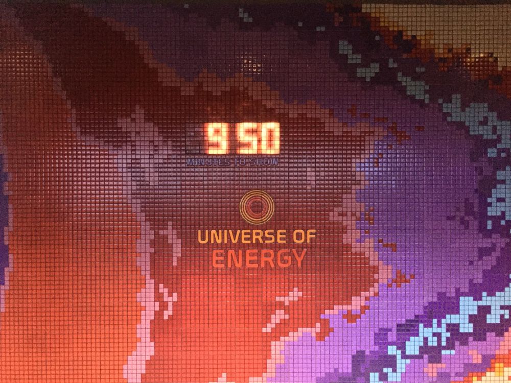 The countdown clock and entrance sign inside the Sun mural at the Universe of Energy, stopped at 9:50