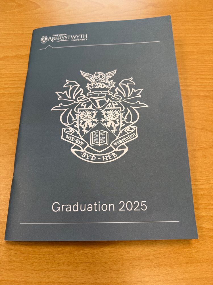 Front cover of the graduation booklet
