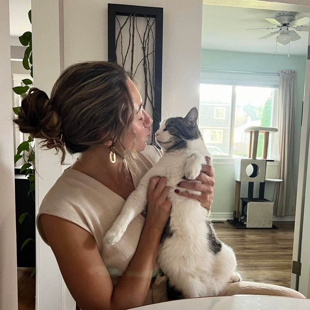 Girl holding her cat