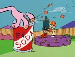A screen grab from ed Edd and eddy where eddy is opening a soda while double d is in the background. 