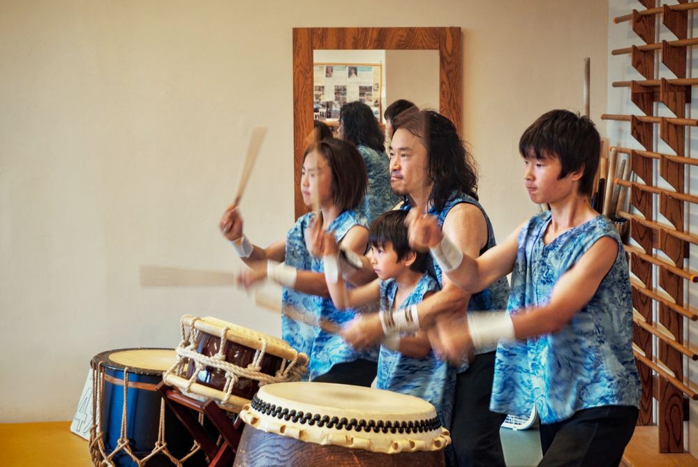 A Journey of 1000 Performances

The Takumi Kato family is back in town, visiting from Pittsburgh, Pennsylvania. Dad is a world-champion Taiko drummer from Japan. They plan to tour all 50 States and do 1000 performances. What an uplifting experience for the kids to travel and be on stage! This time they performed at the Japanese Art & Cultural Center in San Jose. Unexpectedly, they asked me to be the MC, which I happily accepted. It was their 498th performance.

-- ƒ/6.3, 49 mm, 1/50 sec, ISO 1600, Sony A6400, SEL-P1650, HDR, 1 RAW exposure, _DSC2601_2_3_hdr3bal1pai5rea1e.jpg
-- CC BY-NC-SA 4.0, © 2025 Peter Thoeny, Quality HDR Photography
