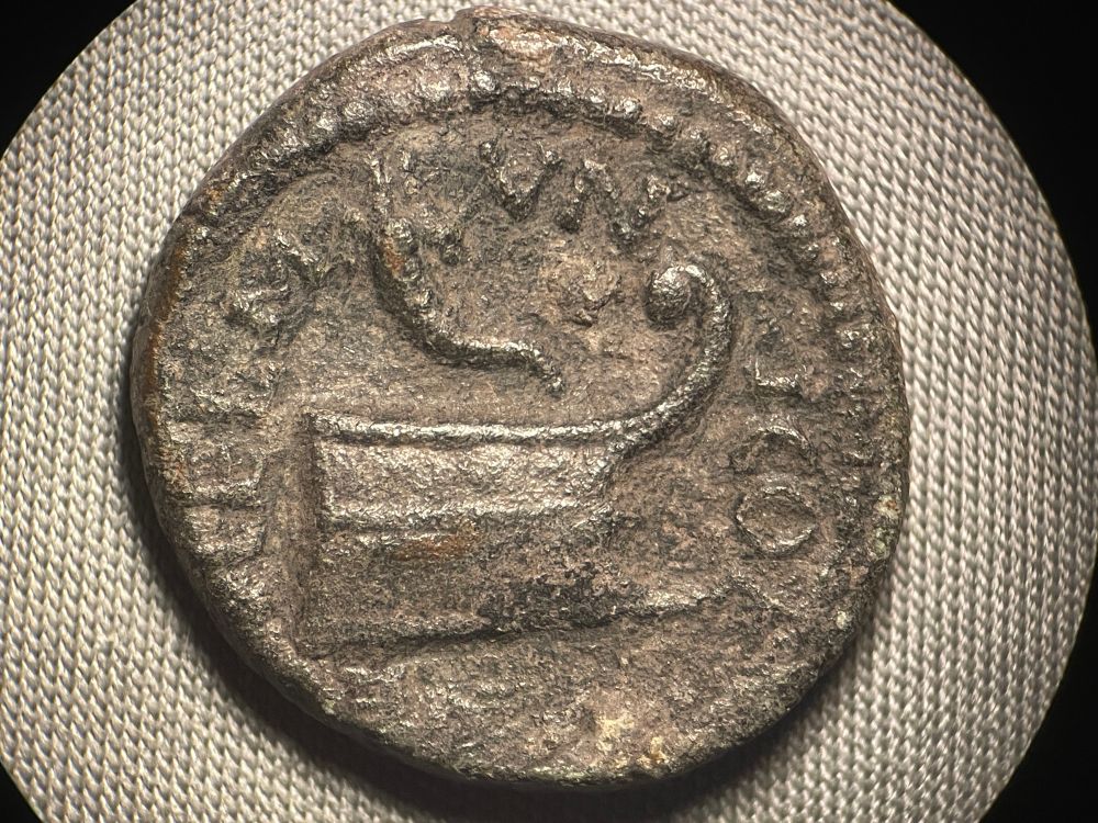 Reverse AEL MVNI COELANE
Prow with naval ram, cornucopia above