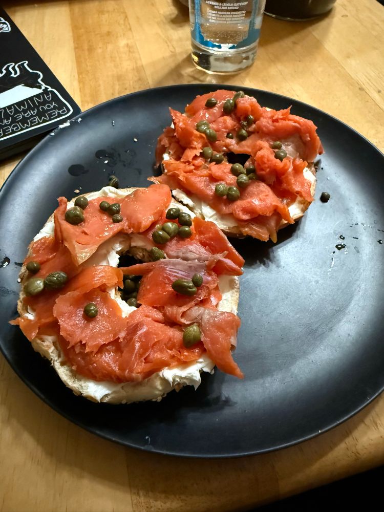 A plate of bagels with lox