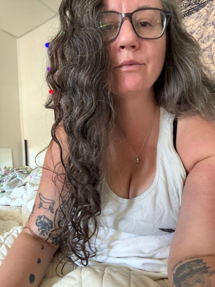 Selfie sitting in my bed 