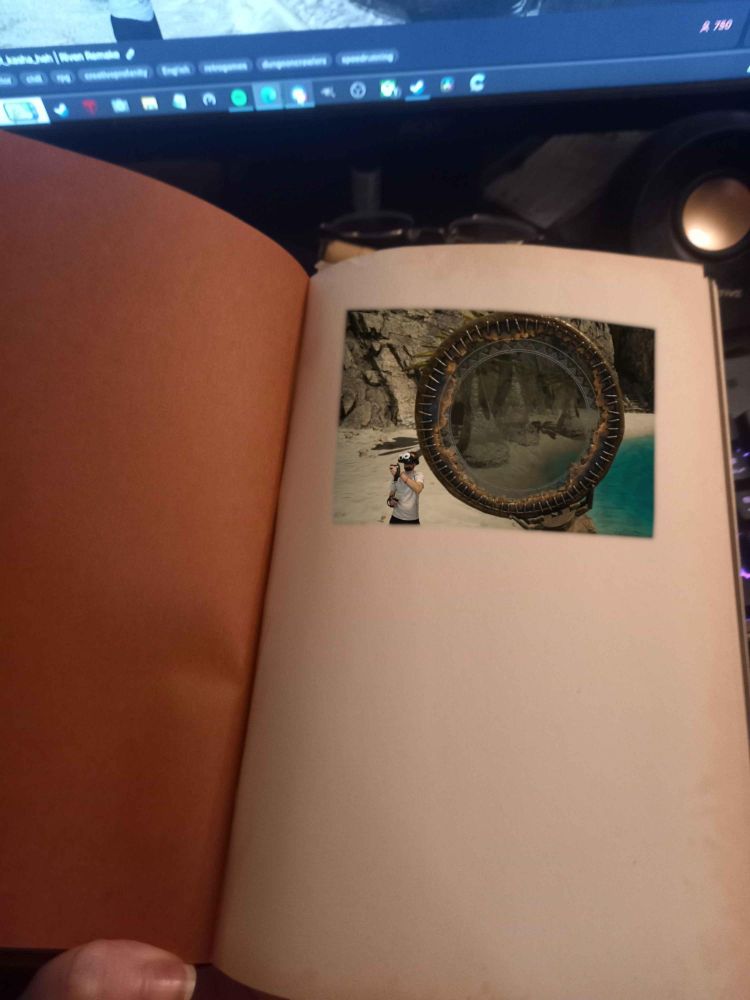 Book open to show streamer LobosJR trapped within the realm of the book, searching for jizz with his jizz lens.