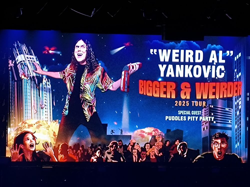 A promo image for "Weird Al" Yankovic's current tour. This pun doesn't quite work since the text is all caps but look,