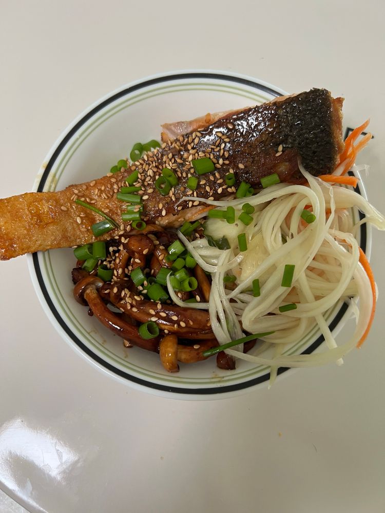 Pan seared teriyaki salmon with shimeji mushrooms and pickled daikon and carrot