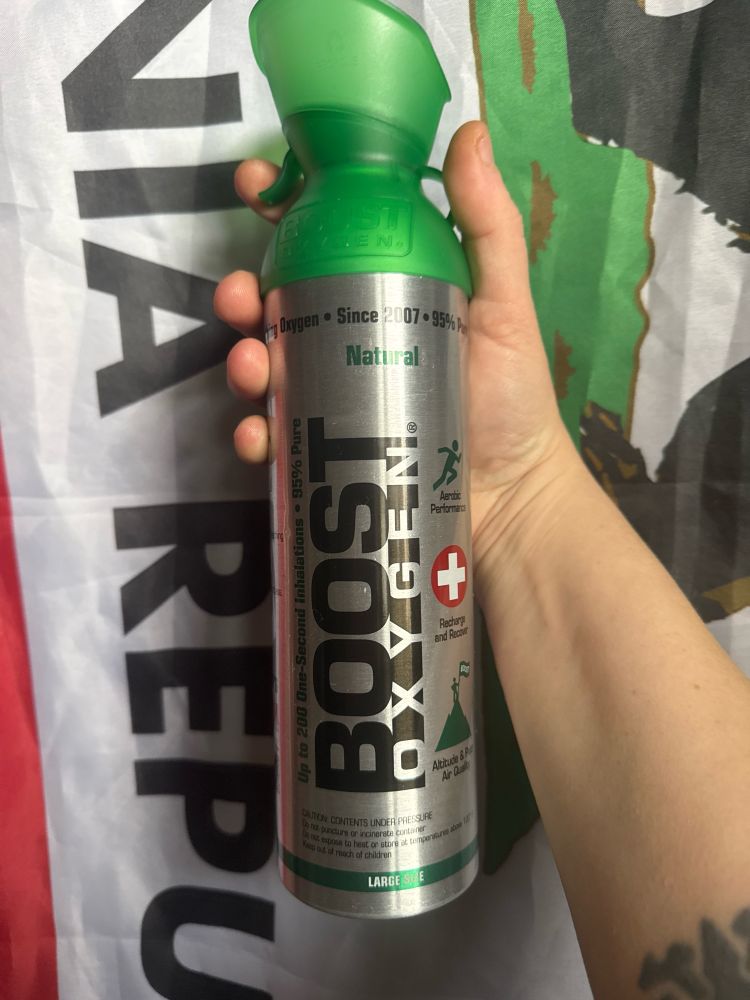 a mayo man holding a REAL bottle of canned air 