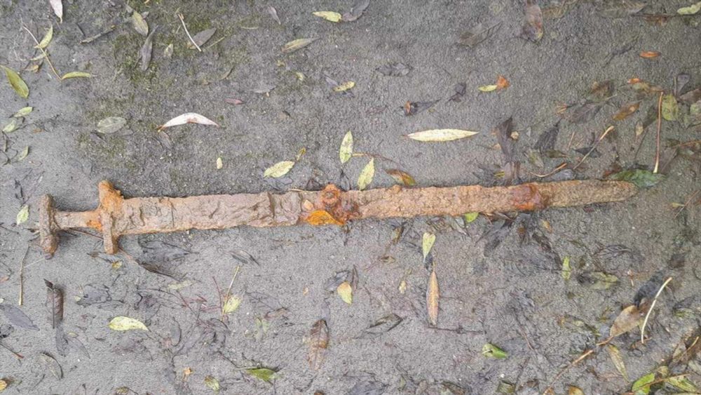 1,100-year-old Viking sword pulled from UK river by magnet fisher