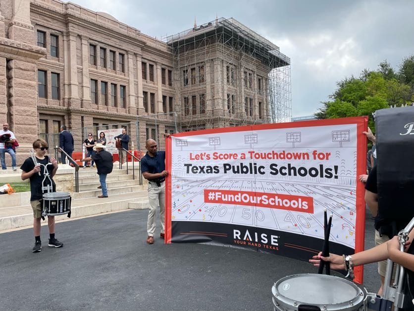 Public school advocates get ready to breakthru a Let's Score a Touchdown for Texas Public Schools