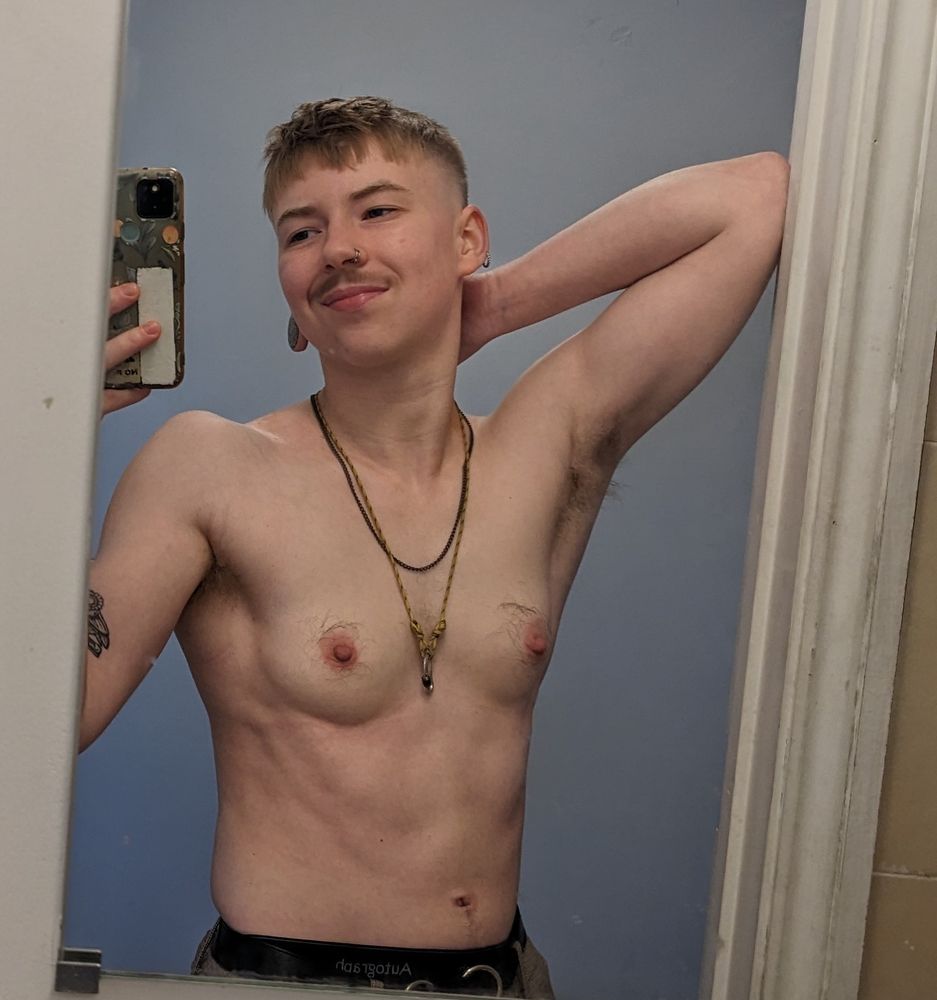 Shirtless guy in the mirror, but now he's smiling!! Oww isn't that nice. Do u think u could take him in a fight