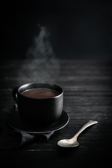 Dark coffee in a dark room 