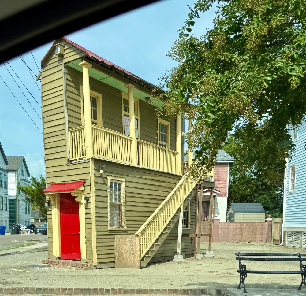 Very skinny house alone on a lot