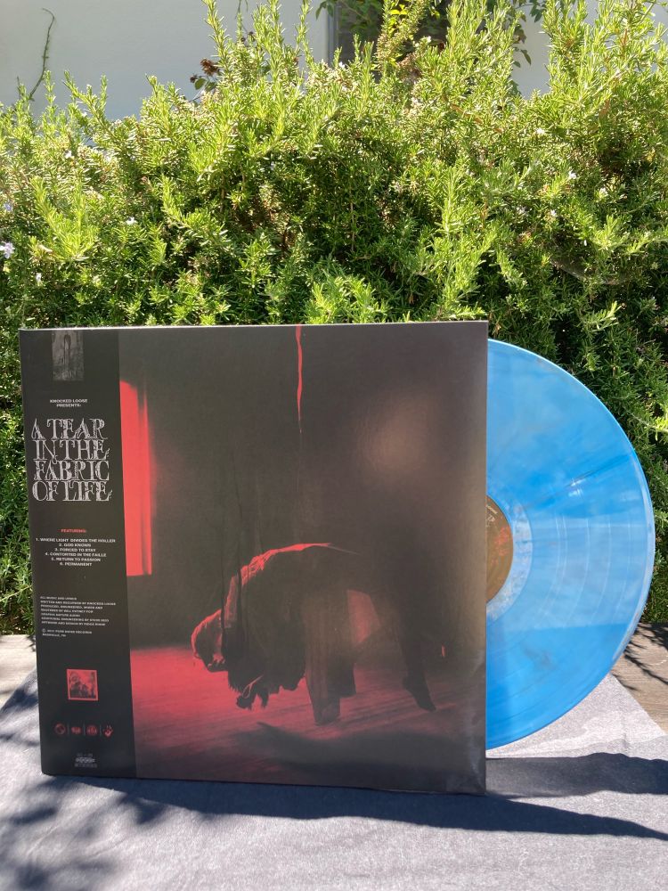 Front vinyl cover of Knocked Loose’s EP A Tear in the Fabric of Life 