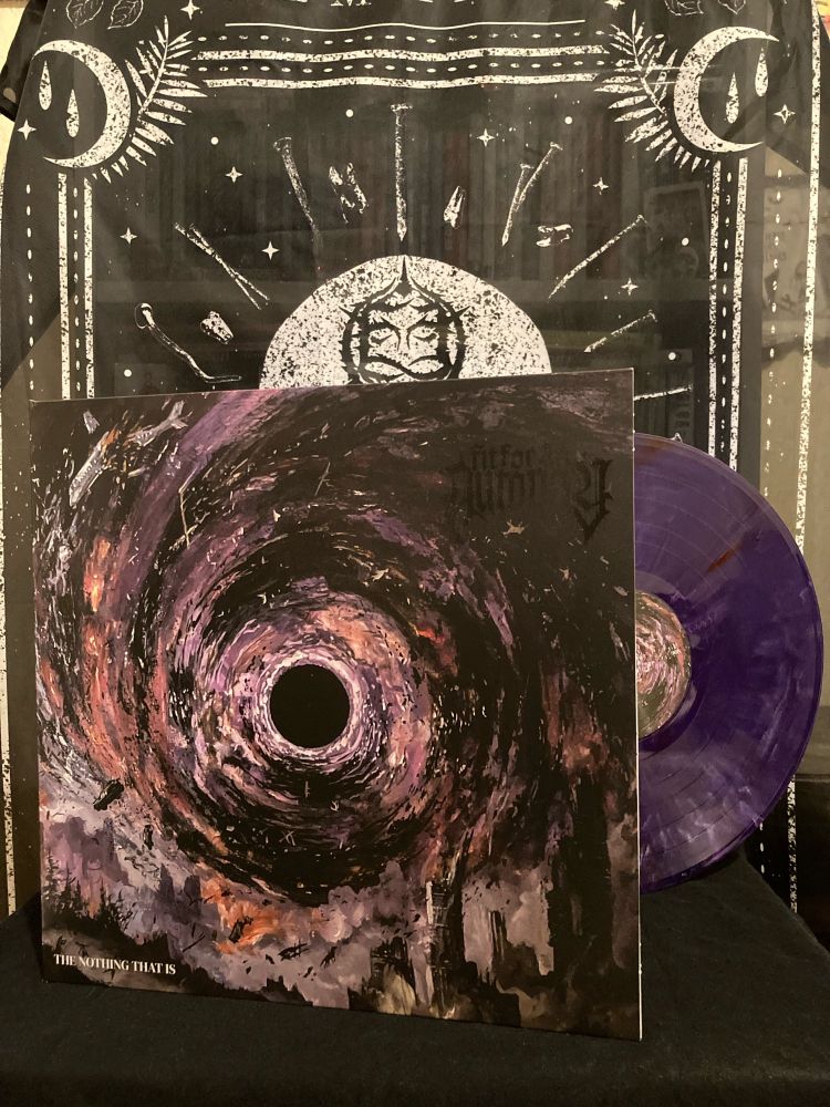 Cover art for Fit For An Autopsy’s record The Nothing That Is. The art depicts a purplish vortex swallowing society around it. 