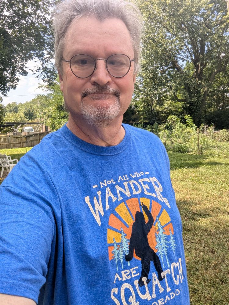 Me wearing a T-shirt that says 