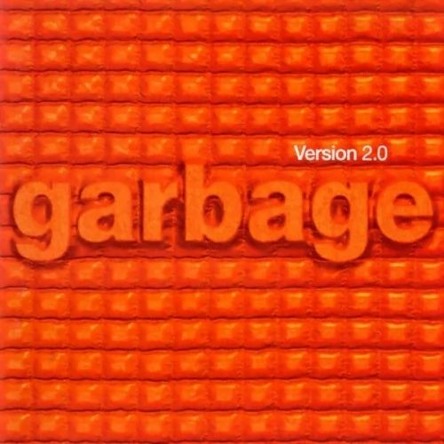 The album cover to Garbage's Version 2.0 album. It's orange, has 'garbage' written across the center in raised letters, and a little 'Version 2.0' in white to the upper right.