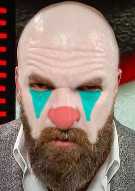 A picture of Triple H with clown makeup on. But it's not saying much because he's been a clown all his life.