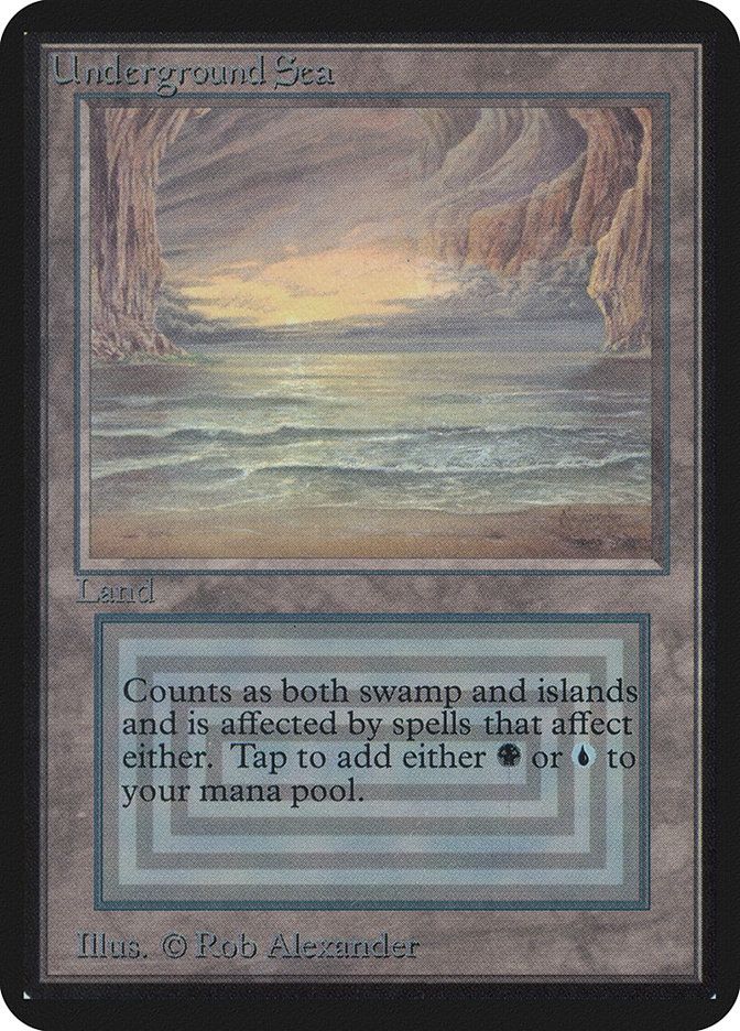 The Magic the Gathering card Underground Sea. The art on the card is waves lapping on a beach with stone walls right, left, and above the water where the sky should be. The text on the card is "Land. Counts as both swamp and islands and is affected by spells that affect either. Tap to add either 💀 (black mana) or 💧 (blue mana) to your mana pool. Illus. Rob Alexander" The text is difficult to read because it's on a background of blue and grey rectangles.