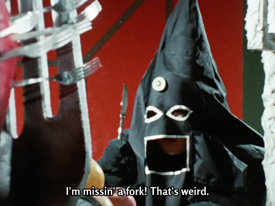 Daita Ooiwa (aka Kirenger), complains about missing a fork while disguised as a villain.