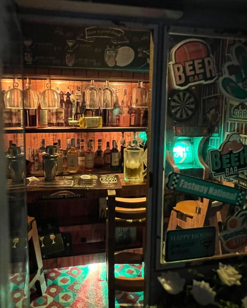 We're stepping through the door inside the bar