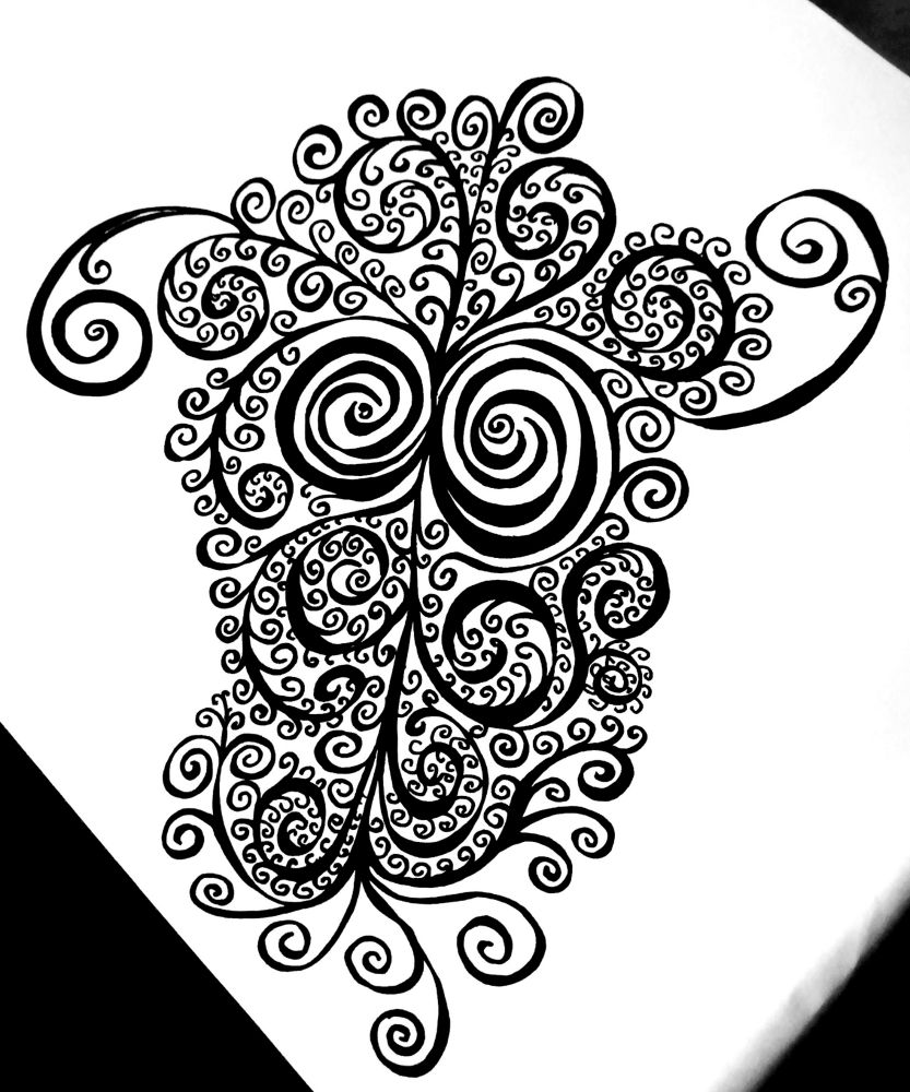 Zeichnung aus Kringeln. Zwei ktingige Augen und Ohren und ganz viele kleine Kringel an jedem Kringel. Und was Zungenähnliches. 