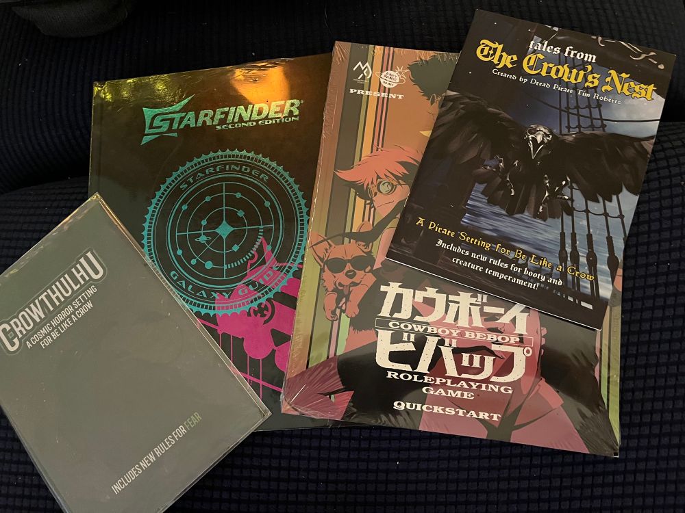 Purchased items to support my local friendly gaming stores! Special Edition Starfinder 2e Galaxy Guide, Cowboy Bebop RPg QuickStart and supplements for solo RPG Like a Crow/ Crowthulhuvand Tales from the Crow’s Nest
