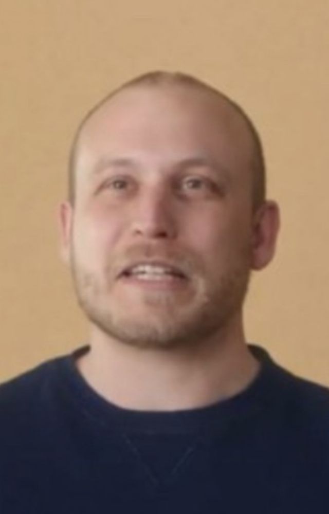 a very happy man smiling happily and NOT questioning the choices that lead him to this moment!