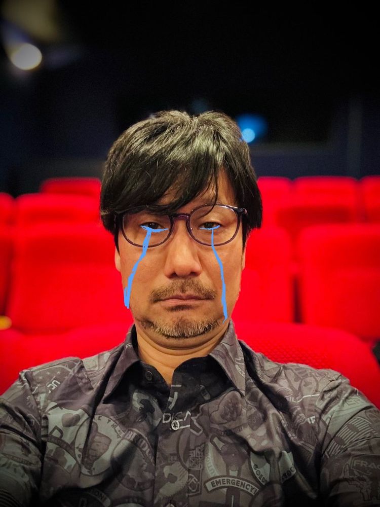 Hideo kojima in the movie theater with tears streaming down his face