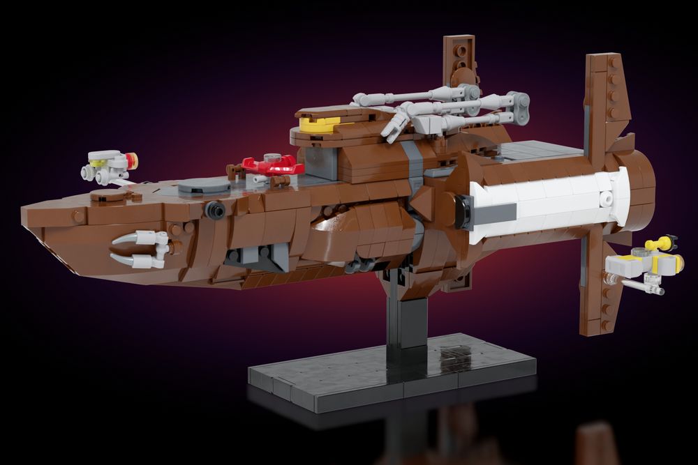 LEGO model of the Bebop from Cowboy Bebop, with miniature personal starships attached and against a black background.