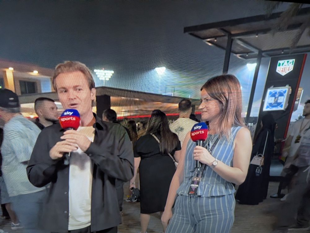 Bernie Collins looking at Nico Rosberg like she's trying to explode him with her mind