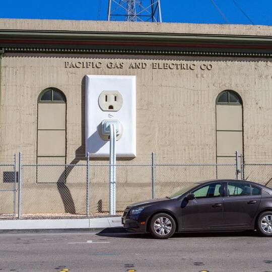 the giant wall outlet and plug in Petaluma, CA, used in promotional material for the underscores album Wallsocket