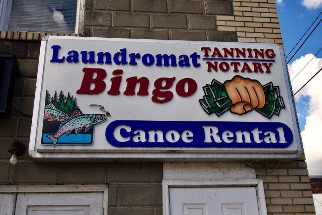 Sign for a store that is a
Laundromat
Bingo
Tanning
Notary
Canoe rental
