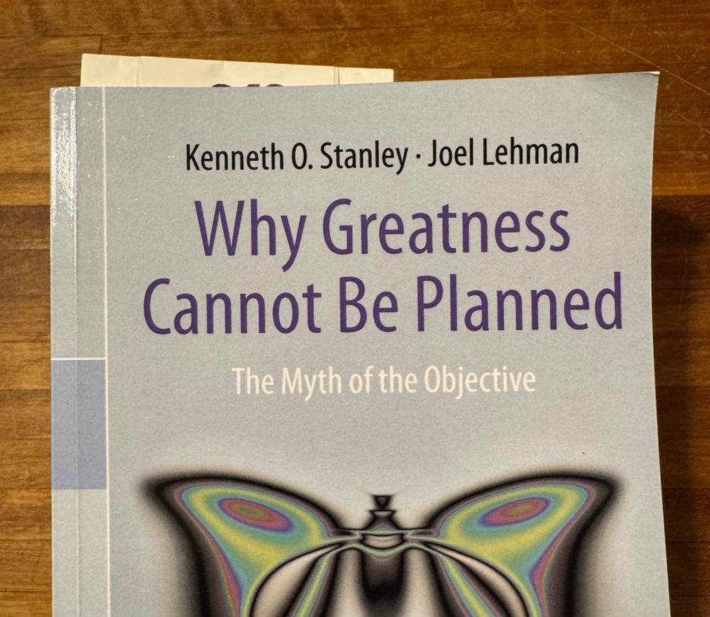A photo of the book “Why Greatness Cannot Be Planned - The Myth of the Objective” by Kenneth O. Stanley and Joel Lehman. 