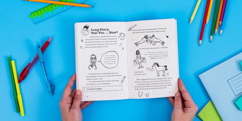 A sample page of Loki: A Bad God's Guide to Unruly Activities with two white hands holding it open, against a school-y backdrop of pencils, ruler, pens and notebook. The page shows Loki about to tell one of his "long stories". Will it be the story of the time he fought Heimdall in the form of a seal? (We see a doodle of this battle) The time Loki lived underground as a milkmaid? Or the time she was a horse? Spoiler: It's not going to be any of those, because he loves teasing stories he refuses to tell...