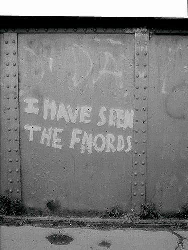 British Railway bridge, sporting the graffitti text
"I HAVE SEEN THE FNORDS".