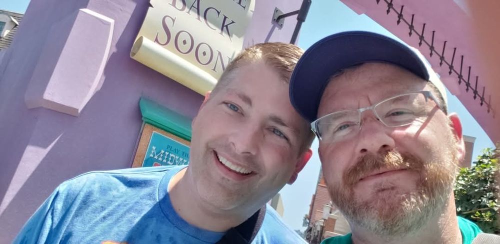 Tom and his Quinn at Krustyland in Universal Studios Hollywood. Tom broke a ton of bones 18 hours prior and is smiling away through it all. 